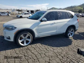 2015 BMW X5 xDrive50i z VIN 5UXKR6C53F0J79425, wystawiony jako Copart lot #52917565 z przebiegiem 173 344 mil mil oraz Tytuł czysty. Historia ofert i sprzedaży dostępna na DreamBid. Obrazek 1.