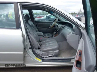 2000 Toyota Avalon XL with VIN 4T1BF28B8YU072752, listed as a IAAI auction lot 42202327 with Not Provided miles and . Bid and sale history available at DreamBid. Image 5.