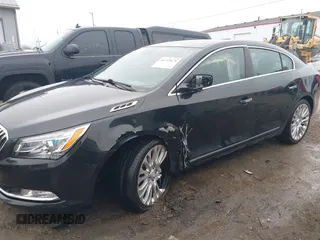 2014 Buick LaCrosse Premium II with VIN 1G4GF5G39EF305104, listed as a IAAI auction lot 41715121 with 81,341 mi miles and . Bid and sale history available at DreamBid. Image 14.
