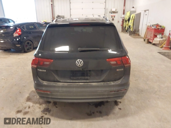 2019 Volkswagen Tiguan S with VIN 3VV0B7AX3KM182311, listed as a IAAI auction lot 41727114 with 98,035 mi miles and . Bid and sale history available at DreamBid. Image 16.