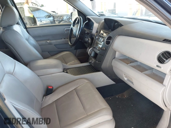 2013 Honda Pilot Touring with VIN 5FNYF4H95DB079782, listed as a IAAI auction lot 42737391 with 152,830 mi miles and . Bid and sale history available at DreamBid. Image 5.