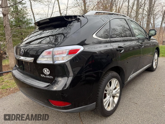 2010 Lexus RX 450h with VIN JTJBC1BA2A2412709, listed as a Copart auction lot 54962565 with 240,611 mi miles and Clean Title. Bid and sale history available at DreamBid. Image 4.