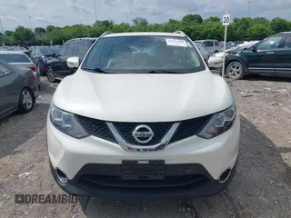 2017 Nissan Rogue SV with VIN JN1BJ1CR3HW100711, listed as a IAAI auction lot 42157090 with 106,067 mi miles and . Bid and sale history available at DreamBid. Image 12.
