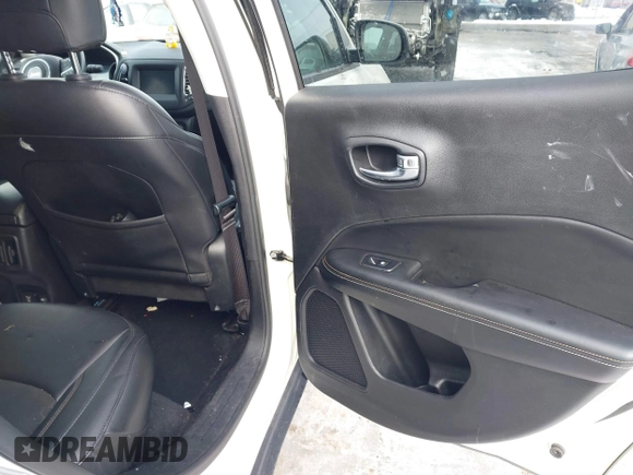2019 Jeep Compass Latitude with VIN 3C4NJDBB0KT813014, listed as a IAAI auction lot 41560221 with 63,307 mi miles. Bid and sale history available at carsss.com. Image 8.