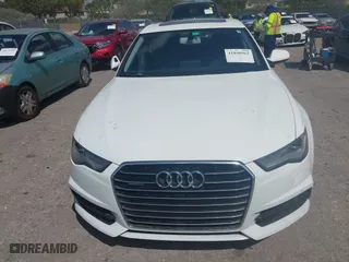 2016 Audi A6 3.0T Premium Plus with VIN WAUFGAFC9GN003664, listed as a IAAI auction lot 41890962 with 100,485 mi miles. Bid and sale history available at carsss.com. Image 12.