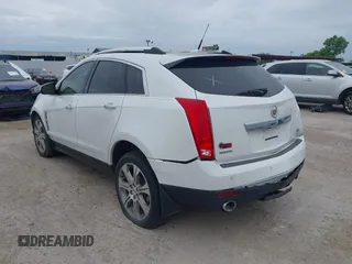 2012 Cadillac SRX Premium Collection with VIN 3GYFNCE32CS579256, listed as a IAAI auction lot 42660666 with 125,236 mi miles and . Bid and sale history available at DreamBid. Image 3.