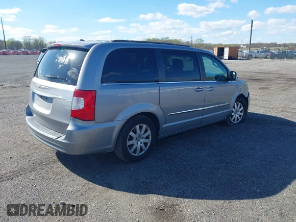 2016 Chrysler Town & Country Touring with VIN 2C4RC1BG5GR175293, listed as a IAAI auction lot 41985609 with 154,638 mi miles. Bid and sale history available at carsss.com. Image 4.