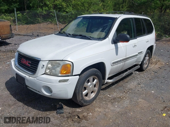 2003 GMC Envoy SLT with VIN 1GKDS13S632266506, listed as a IAAI auction lot 42149049 with 259,884 mi miles and . Bid and sale history available at DreamBid. Image 2.