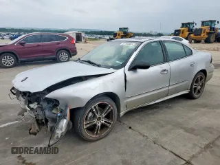 2003 Pontiac Grand Am SE1 z VIN 1G2NF52F53C110665, wystawiony jako Copart lot #57164865 z przebiegiem 206 086 mil mil oraz Szkody całkowita. Historia ofert i sprzedaży dostępna na DreamBid. Obrazek 1.
