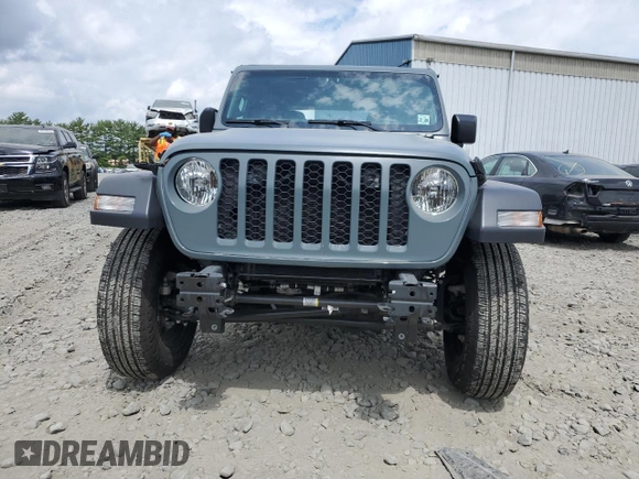 2024 Jeep Wrangler Sport S with VIN 1C4PJXAN5RW123740, listed as a Copart auction lot 62877324 with 5,758 mi miles and Salvage title. Bid and sale history available at DreamBid. Image 5.