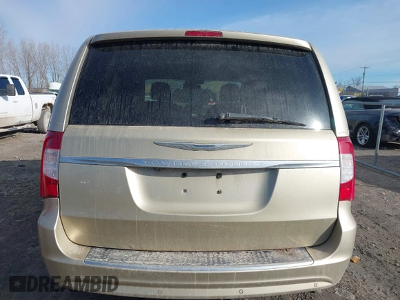 2011 Chrysler Town & Country Touring z VIN 2A4RR5DG6BR655235, wystawiony jako IAAI lot #41811240 z przebiegiem 244 399 mil mil oraz . Historia ofert i sprzedaży dostępna na DreamBid. Obrazek 16.