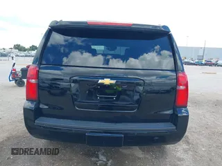 2015 Chevrolet Tahoe LT with VIN 1GNSCBKCXFR214072, listed as a IAAI auction lot 40512435 with 98,955 mi miles and . Bid and sale history available at DreamBid. Image 17.
