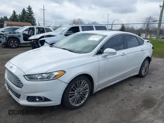 2015 Ford Fusion SE with VIN 3FA6P0H9XFR181132, listed as a IAAI auction lot 41075635 with 216,089 mi miles and . Bid and sale history available at DreamBid. Image 18.