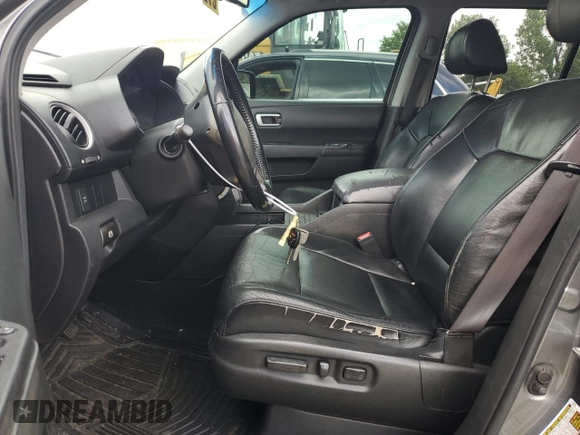 2009 Honda Pilot EX-L z VIN 5FNYF485X9B053974, wystawiony jako Copart lot #58231475 z przebiegiem 222 489 mil mil oraz Szkoda całkowita • Salvage title. Historia ofert i sprzedaży dostępna na DreamBid. Obrazek 7.