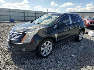 2013 Cadillac SRX Performance Collection z VIN 3GYFNHE37DS649235, wystawiony jako Copart lot #56939285 z przebiegiem 104 692 mil mil oraz Szkoda całkowita • Salvage title. Historia ofert i sprzedaży dostępna na DreamBid. Obrazek 1.