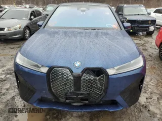 2023 BMW iX xDrive50 with VIN WB523CF09PCM04671, listed as a Copart auction lot 38947734 with 0 mi miles. Bid and sale history available at carsss.com. Image 5.