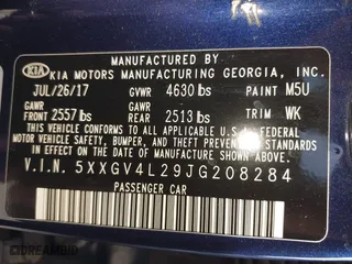 2018 Kia Optima SX with VIN 5XXGV4L29JG208284, listed as a IAAI auction lot 41765005 with 77,189 mi miles. Bid and sale history available at carsss.com. Image 9.