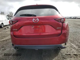 2021 Mazda CX-5 Grand Touring with VIN JM3KFADM1M1395789, listed as a Copart auction lot 45479385 with 38,179 mi miles and Salvage Title. Bid and sale history available at carsss.com. Image 6.