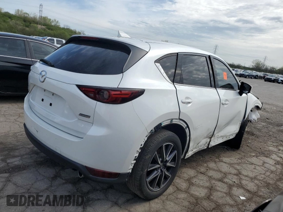 2018 Mazda CX-5 Grand Touring with VIN JM3KFBDM6J0421228, listed as a Copart auction lot 54915685 with Not Provided miles and Clean Title. Bid and sale history available at DreamBid. Image 3.