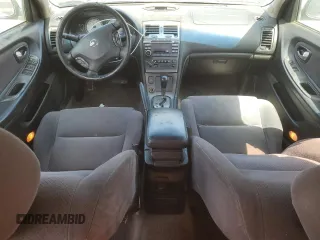 2002 Nissan Maxima GXE z VIN JN1DA31D62T404510, wystawiony jako Copart lot #51367005 z przebiegiem 185 156 mil mil oraz Czysty tytuł • Clean title. Historia ofert i sprzedaży dostępna na DreamBid. Obrazek 8.
