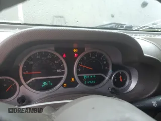 2007 Jeep Wrangler Unlimited Sahara с VIN 1J4GA59107L141710, выставлен на аукционе Copart как лот 59939755 с пробегом 212 659 миль миль и Списание • Salvage title. История ставок и продаж доступна на DreamBid. Изображение 9.