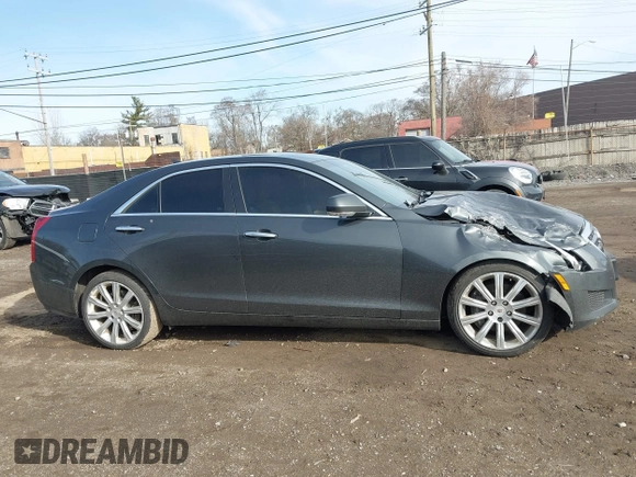 2014 Cadillac ATS Luxury AWD z VIN 1G6AH5RX6E0140302, wystawiony jako IAAI lot #41843454 z przebiegiem 125 388 mil mil oraz . Historia ofert i sprzedaży dostępna na DreamBid. Obrazek 13.