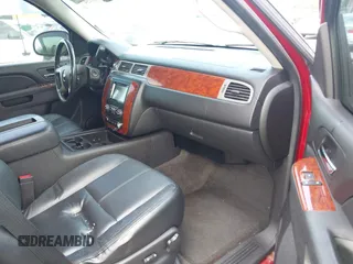 2013 Chevrolet Tahoe LS with VIN 1GNSCAE00DR359498, listed as a IAAI auction lot 40125477 with 156,100 mi miles and . Bid and sale history available at DreamBid. Image 5.
