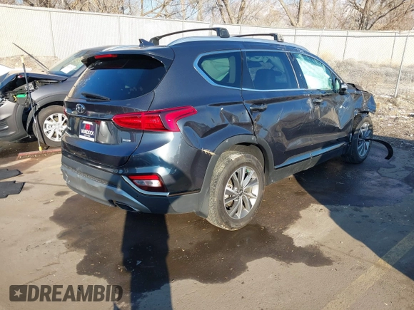2020 Hyundai Santa Fe Limited with VIN 5NMS5CAD9LH273715, listed as a IAAI auction lot 41259190 with 14,669 mi miles and . Bid and sale history available at DreamBid. Image 4.