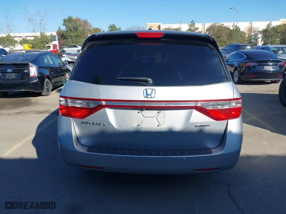 2011 Honda Odyssey Touring with VIN 5FNRL5H9XBB012899, listed as a IAAI auction lot 41611879 with 171,041 mi miles. Bid and sale history available at carsss.com. Image 16.