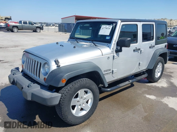 2010 Jeep Wrangler Unlimited Sport with VIN 1J4BA3H17AL211887, listed as a IAAI auction lot 41778324 with 185,626 mi miles. Bid and sale history available at carsss.com. Image 19.
