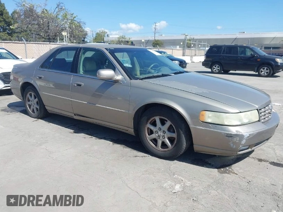 2002 Cadillac Seville Luxury SLS z VIN 1G6KS54Y92U207873, wystawiony jako IAAI lot #41957595 z przebiegiem 118 580 mil mil oraz . Historia ofert i sprzedaży dostępna na DreamBid. Obrazek 1.