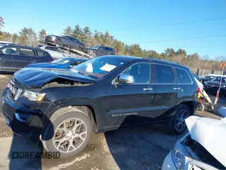 2021 Jeep Grand Cherokee Overland with VIN 1C4RJFCG3MC601150, listed as a IAAI auction lot 41421403 with 165,614 mi miles and . Bid and sale history available at DreamBid. Image 14.