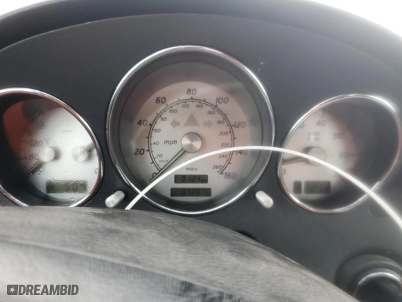 2004 Mercedes-Benz SLK-Class with VIN WDBKK49F34F306967, listed as a Copart auction lot 79557304 with 72,067 mi miles and Salvage Title. Bid and sale history available at carsss.com. Image 9.