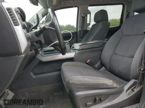 2015 Chevrolet Silverado 1500 LT with VIN 3GCUKREC9FG147988, listed as a Copart auction lot 53784635 with 218,260 mi miles and Salvage Title. Bid and sale history available at DreamBid. Image 7.