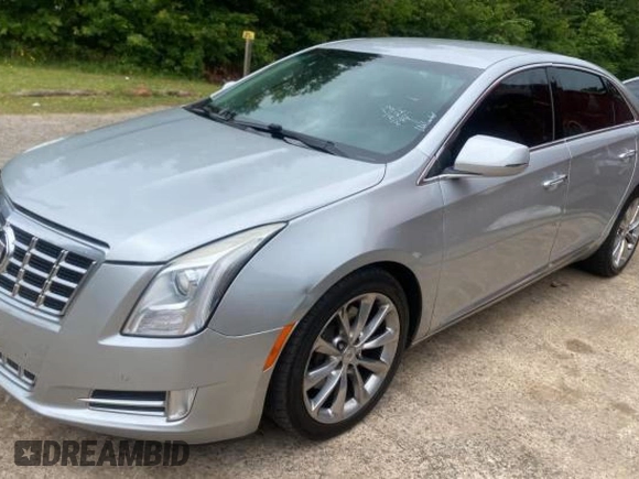 2013 Cadillac XTS Luxury z VIN 2G61P5S33D9171411, wystawiony jako Copart lot #59880945 z przebiegiem 268 029 mil mil oraz Czysty tytuł • Clean title. Historia ofert i sprzedaży dostępna na DreamBid. Obrazek 2.