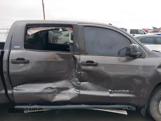 2014 Toyota Tundra SR5 z VIN 5TFEM5F16EX082421, wystawiony jako IAAI lot #40735426 z przebiegiem 173 005 mil mil oraz . Historia ofert i sprzedaży dostępna na DreamBid. Obrazek 12.
