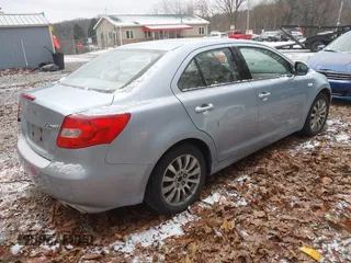 2010 Suzuki Kizashi SE with VIN JS2RE9A30A6101436, listed as a IAAI auction lot 40998132 with 140,786 mi miles and . Bid and sale history available at DreamBid. Image 4.