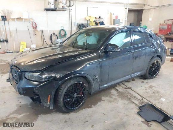 2023 BMW X4 M with VIN 5YM23EC05P9R57259, listed as a IAAI auction lot 41003784 with 33,928 mi miles. Bid and sale history available at carsss.com. Image 2.