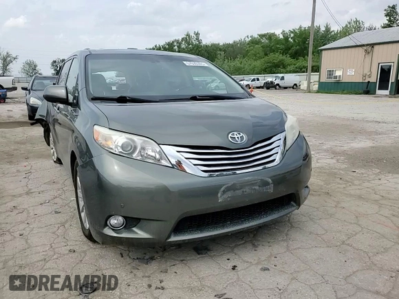 2011 Toyota Sienna XLE AAS z VIN 5TDYK3DC9BS046073, wystawiony jako Copart lot #57030305 z przebiegiem 246 956 mil mil oraz Szkoda całkowita • Salvage title. Historia ofert i sprzedaży dostępna na DreamBid. Obrazek 13.