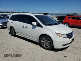 2017 Honda Odyssey Touring z VIN 5FNRL5H93HB015863, wystawiony jako Copart lot #56926815 z przebiegiem 267 380 mil mil oraz Szkoda całkowita • Salvage title. Historia ofert i sprzedaży dostępna na DreamBid. Obrazek 4.