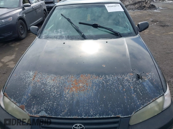 1998 Toyota Camry LE z VIN 4T1BG22K7WU236334, wystawiony jako IAAI lot #41662673 z przebiegiem 182 960 mil mil oraz . Historia ofert i sprzedaży dostępna na DreamBid. Obrazek 12.