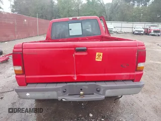 1997 Ford Ranger XL z VIN 1FTCR14A8VPA82103, wystawiony jako IAAI lot #40809996 z przebiegiem Nie podano mil oraz . Historia ofert i sprzedaży dostępna na DreamBid. Obrazek 16.