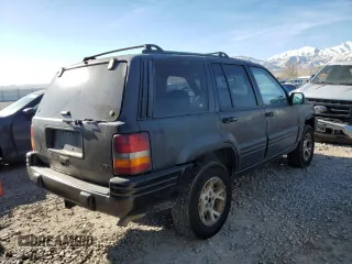 1997 Jeep Grand Cherokee Limited with VIN 1J4GZ78Y1VC563890, listed as a Copart auction lot 41910925 with 0 mi miles and Clean Title. Bid and sale history available at carsss.com. Image 3.