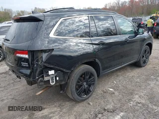 2021 Honda Pilot Special Edition with VIN 5FNYF6H20MB096827, listed as a IAAI auction lot 42076673 with 45,054 mi miles. Bid and sale history available at carsss.com. Image 4.