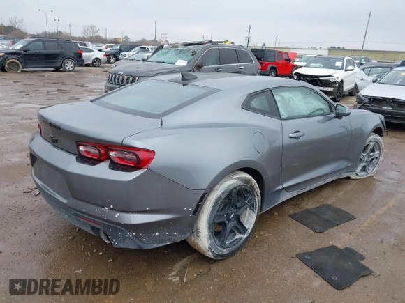 2020 Chevrolet Camaro 1LT z VIN 1G1FB1RX9L0128079, wystawiony jako IAAI lot #41173693 z przebiegiem 88 846 mil mil oraz . Historia ofert i sprzedaży dostępna na DreamBid. Obrazek 4.