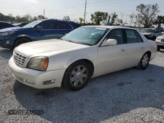 2003 Cadillac DeVille DTS z VIN 1G6KF57933U147843, wystawiony jako Copart lot #55875195 z przebiegiem 160 814 mil mil oraz Szkody całkowita. Historia ofert i sprzedaży dostępna na DreamBid. Obrazek 1.