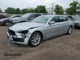 2018 BMW 7 Series 740i xDrive with VIN WBA7E4C56JGV23835, listed as a Copart auction lot 55254573 with 103,713 mi miles. Bid and sale history available at carsss.com. Image 1.