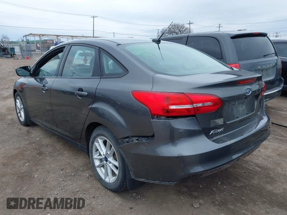 2016 Ford Focus SE with VIN 1FADP3F22GL201887, listed as a IAAI auction lot 41918923 with 119,198 mi miles. Bid and sale history available at carsss.com. Image 3.