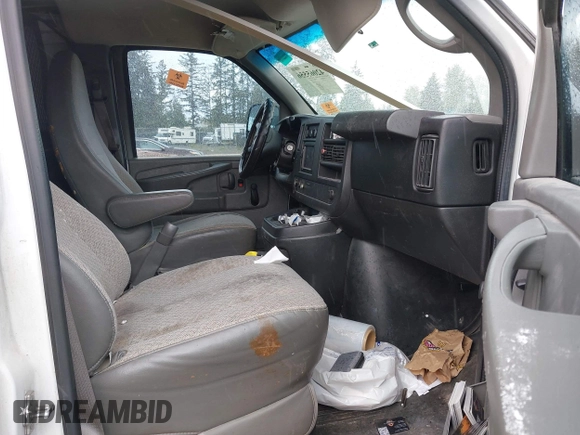 2013 Chevrolet Express Cargo Van with VIN 1GCSGAFX0D1111985, listed as a IAAI auction lot 42065556 with 243,671 mi miles. Bid and sale history available at carsss.com. Image 5.