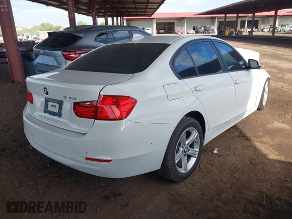 2014 BMW 3 Series 328i with VIN WBA3C1C53EK113046, listed as a IAAI auction lot 42665663 with Not provided miles and . Bid and sale history available at DreamBid. Image 4.
